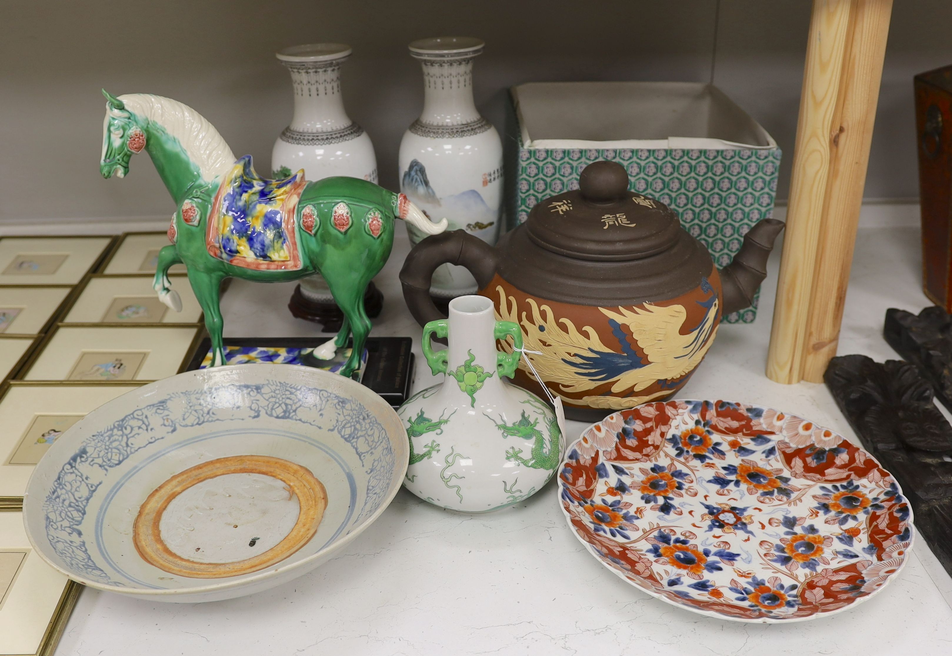 Various Chinese ceramics including a horse model, pair of horse vases, a dragon vase, a blue and white dish, large teapot, and an Imari plate (7)